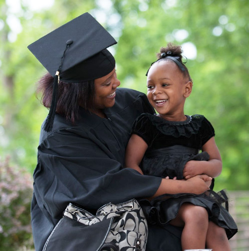 GHC Graduate mother with child