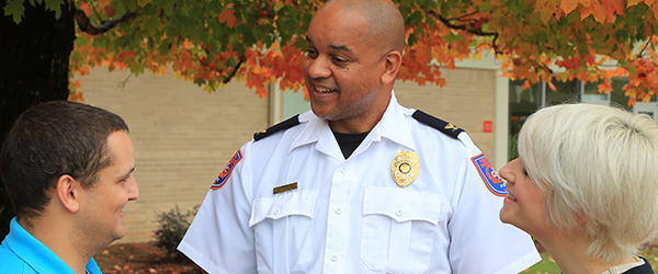 Captain Horace speaks with students