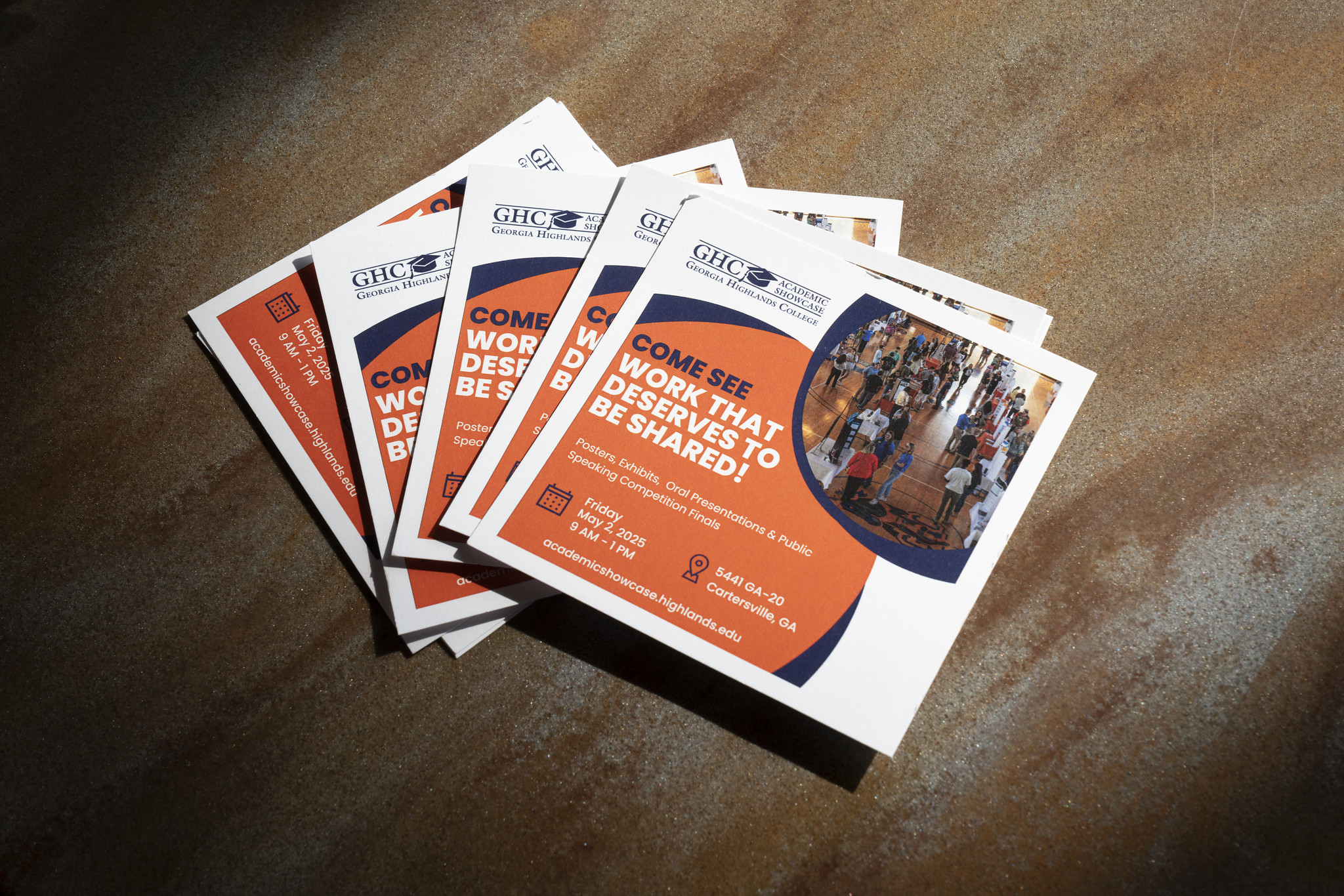 Programs for an event spread across a table.