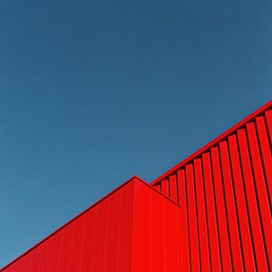 red building against blue sky