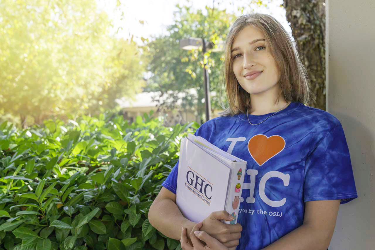 Female student wearing I love GHC t-shirt