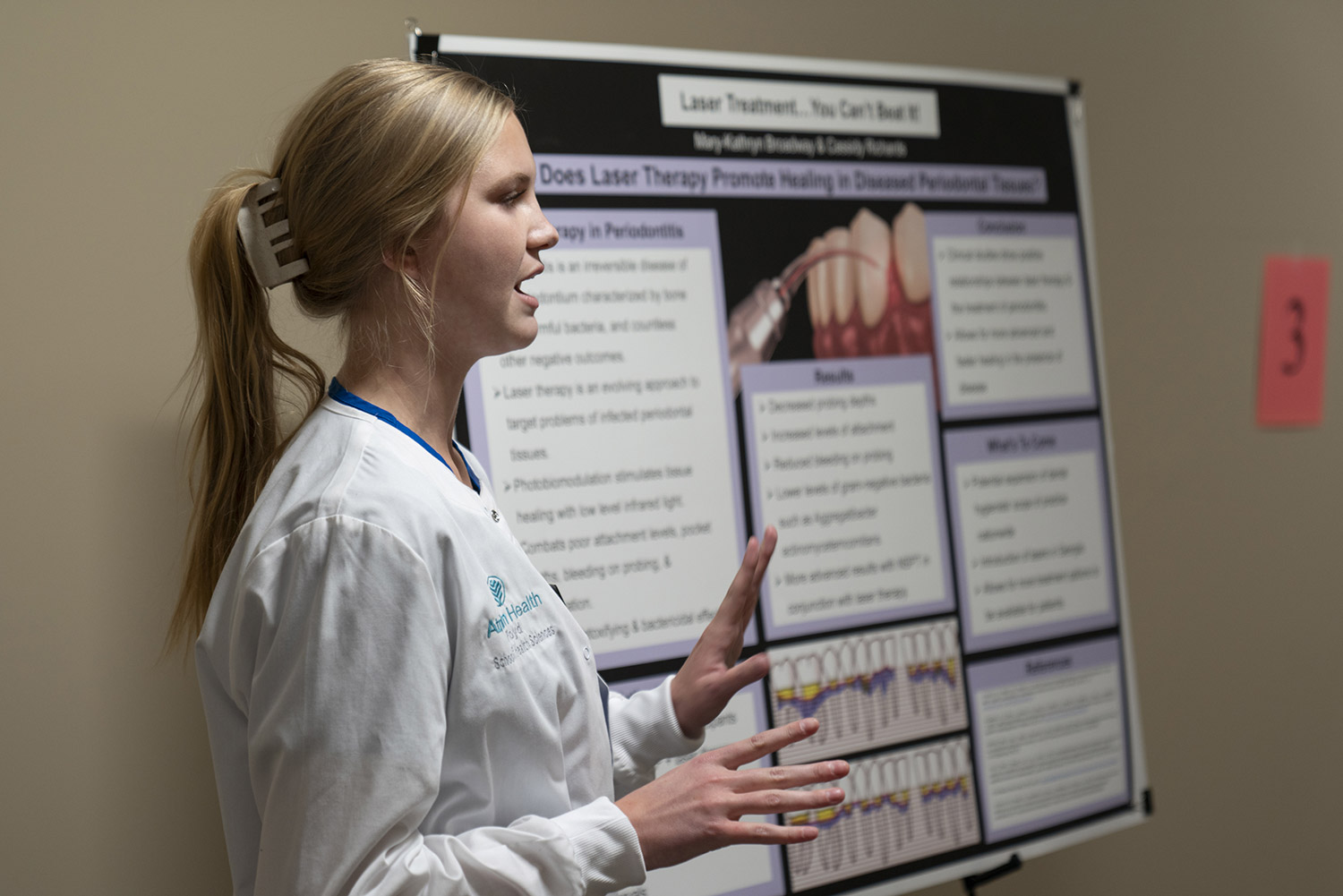 A student presentation at the 25 Years of Dental celebration