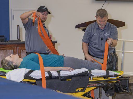 Members of Floyd EMS demonstrate triage techniques.