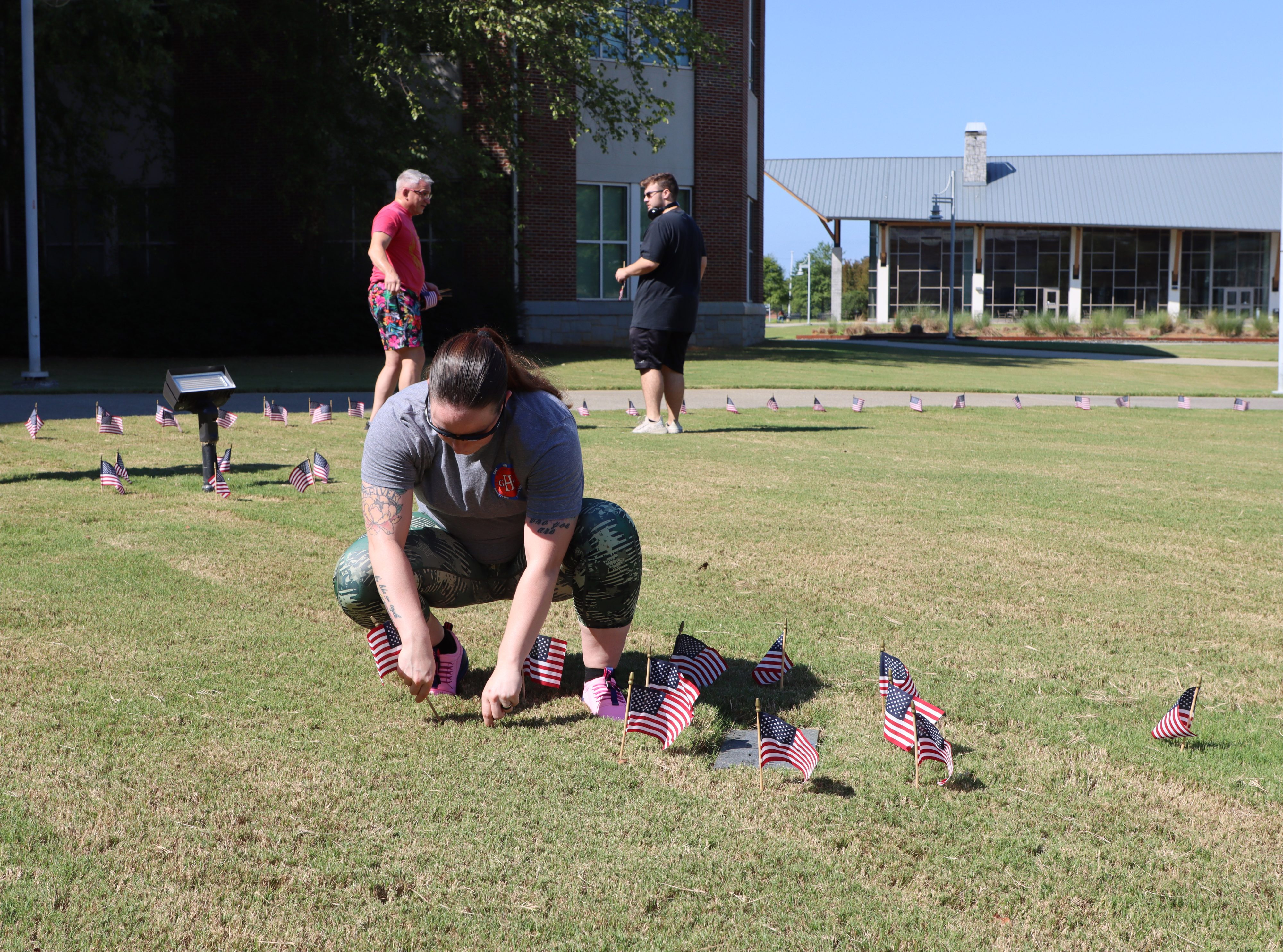 Student placing flags. 