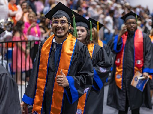 Student walking at graduation