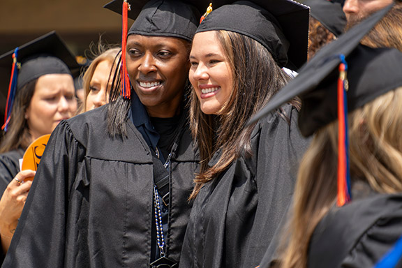 Image of two GHC grads