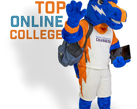 Image of GHC Mascot Bolt with an iPad