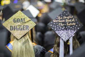 students wearing graduation caps