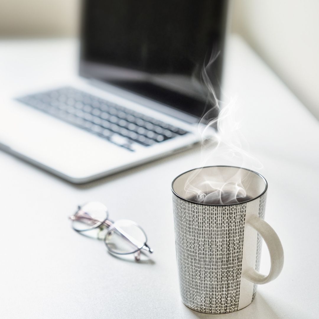 laptop, glasses, and coffee mug