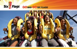 People enjoying a roller coaster at Six Flags