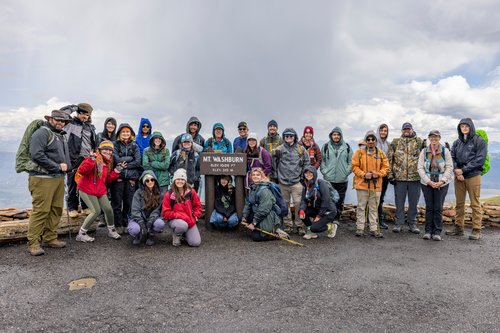 Students on top of Mount Washburn.